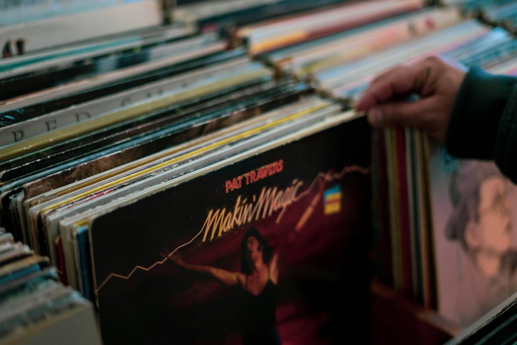 hand browsing through vinyl records