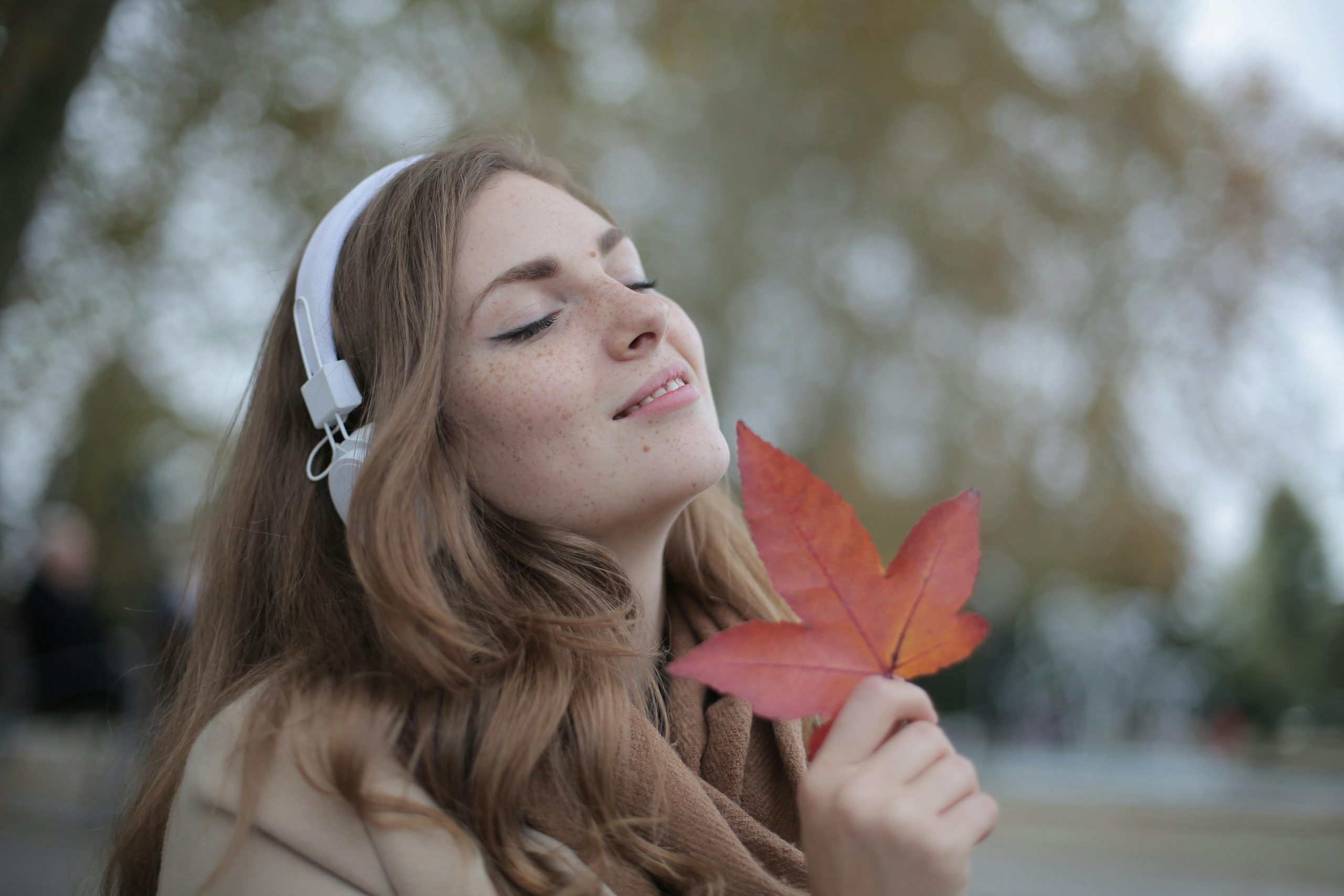 woman with headphones listening to music